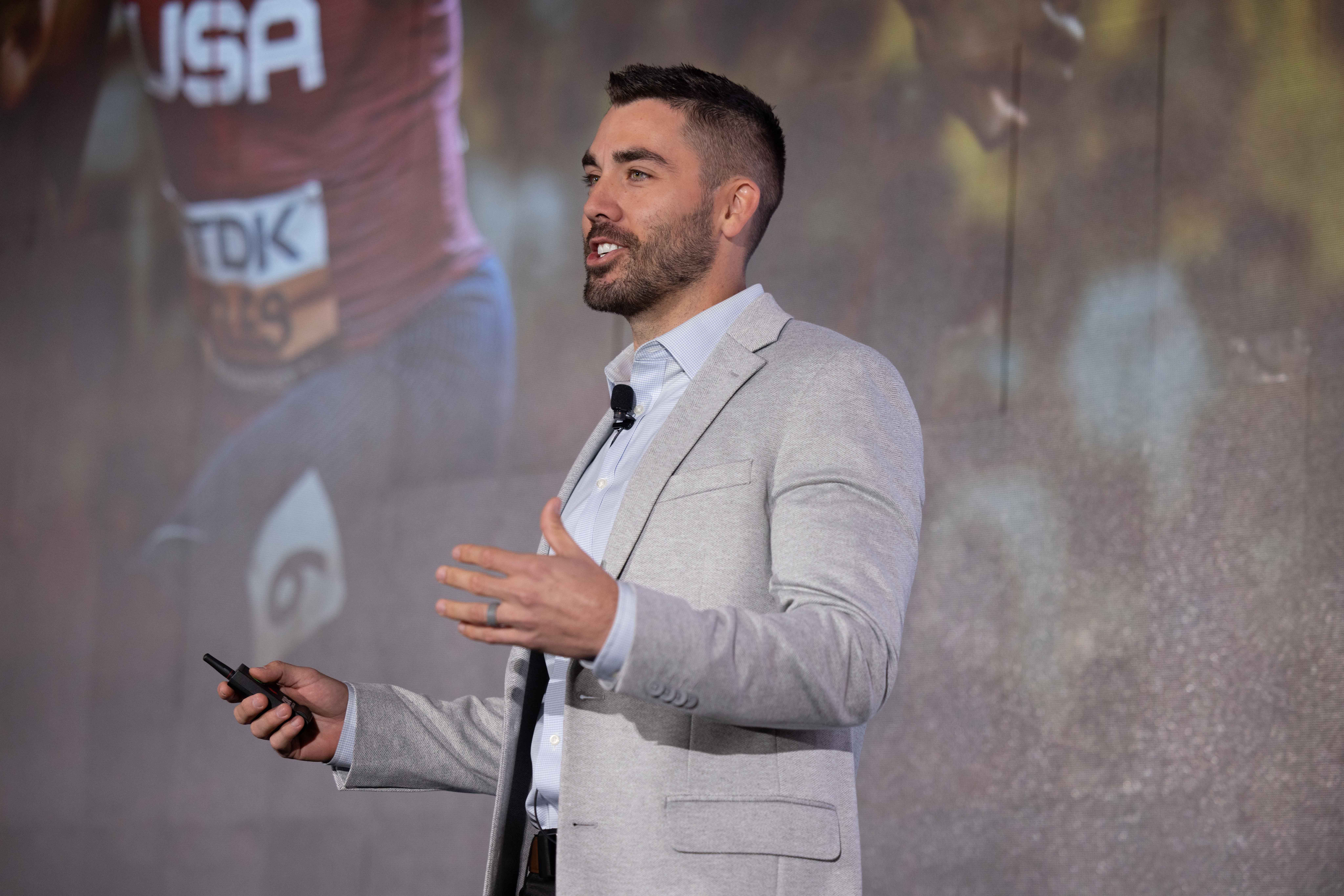 Hunter Goodall presenting at a conference